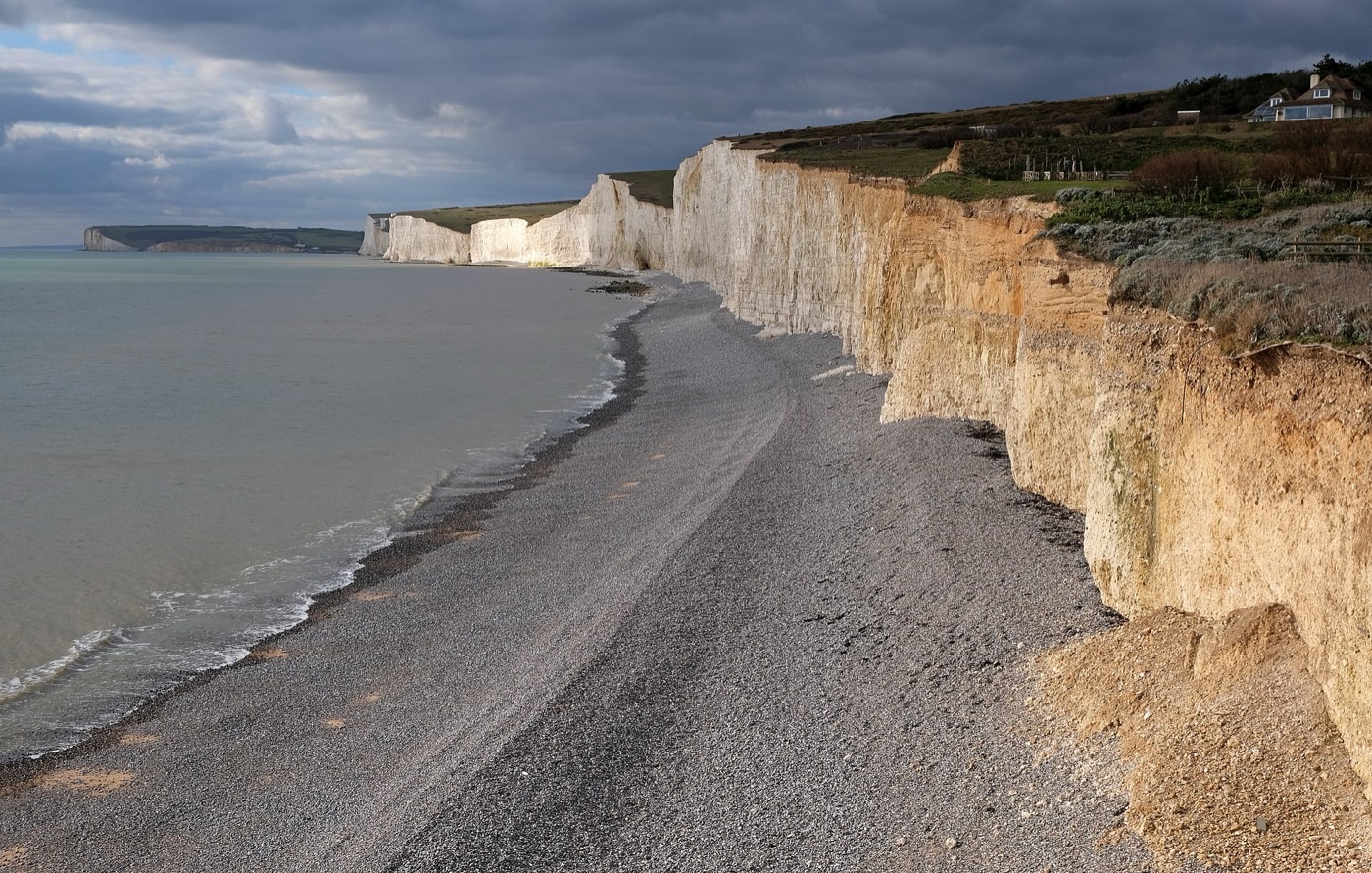 The Seven Sisters chalk cliffs stretching along the East Sussex coast